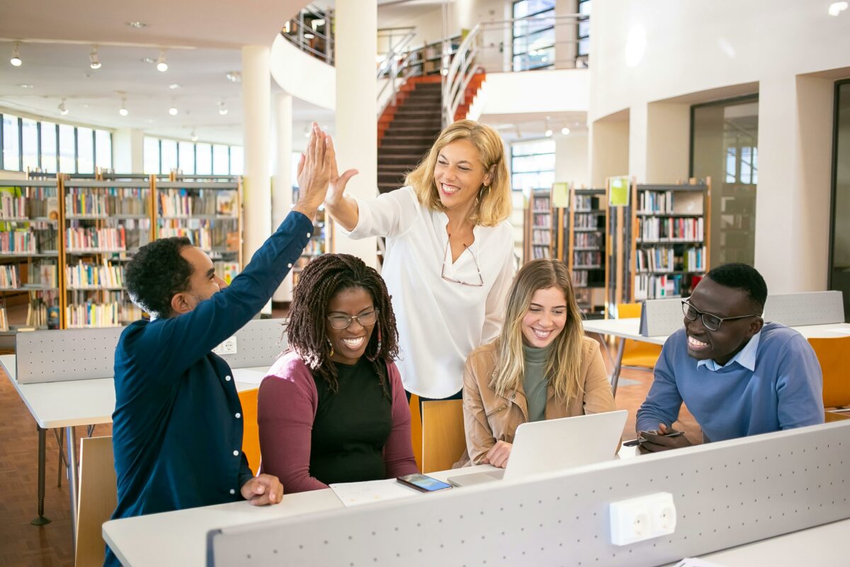 Group Of Students Studying Together